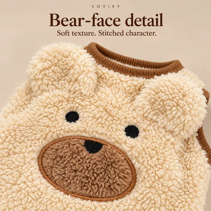 Close-up of bear ears, stitched eyes and a brown muzzle on the Apricot teddy fleece dog vest