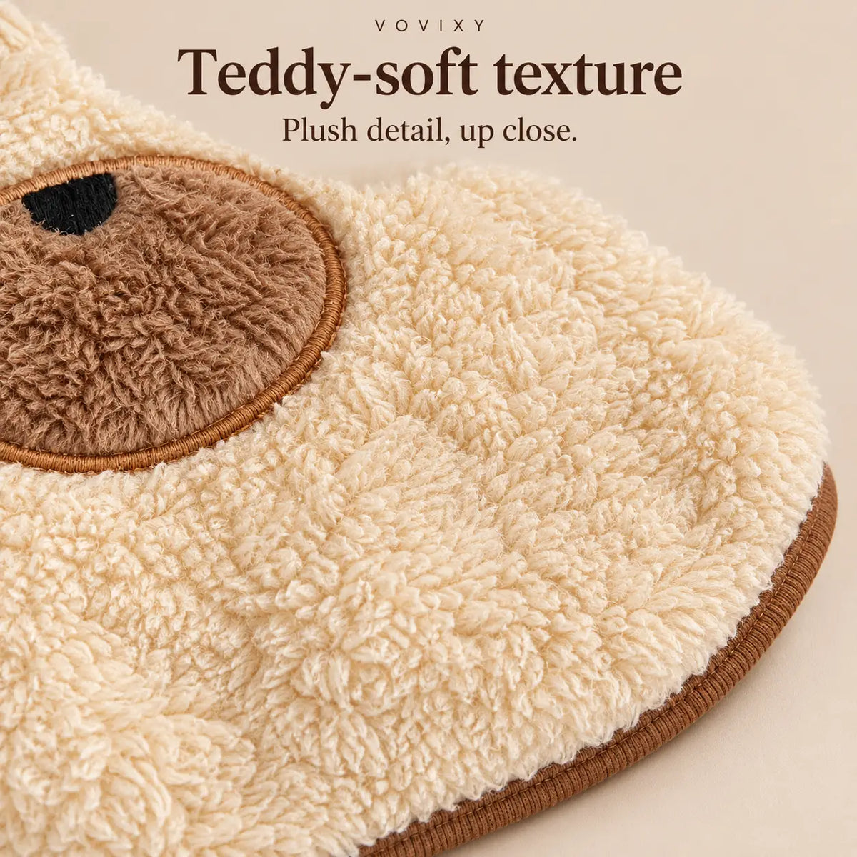 Close-up of the soft teddy fleece texture and brown trim on the Apricot dog vest