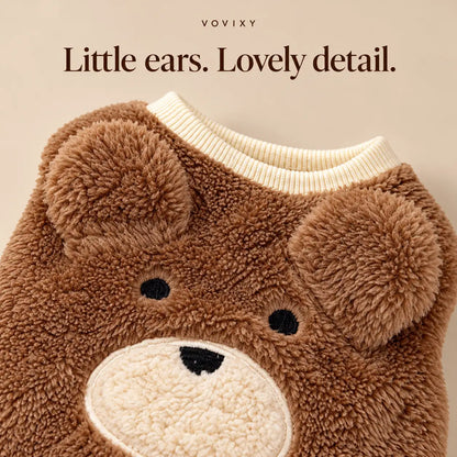 Close-up of rounded bear ears and a stitched bear face on the Brown teddy fleece dog vest