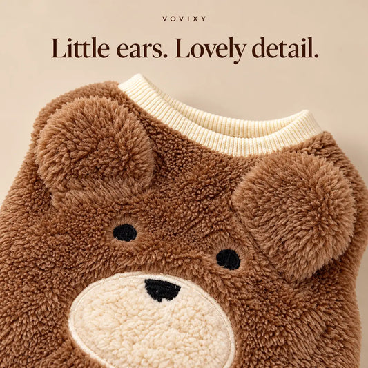 Close-up of rounded bear ears and a stitched bear face on the Brown teddy fleece dog vest