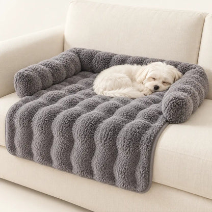 Small white dog sleeping on a Dark Gray plush dog sofa mat with padded edges