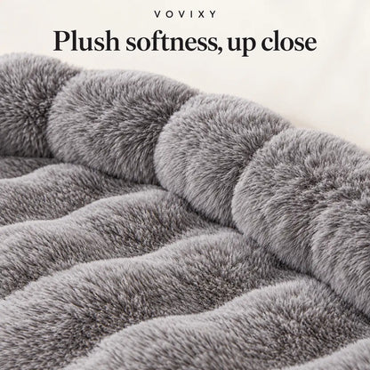 Close-up of the Dark Gray mat's soft plush texture, rippled resting surface and padded edge