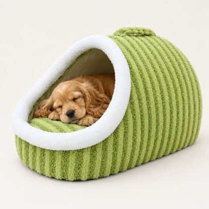 Green Macaron pet cave bed with a sleeping Cocker Spaniel puppy
