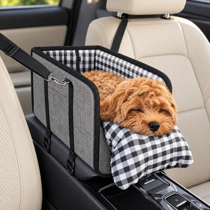 Grey console pet car seat with a small apricot dog resting on the black-and-white plaid front cushion