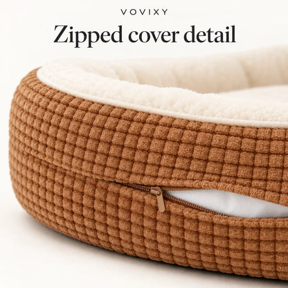 Close-up of the zip opening on the Khaki waffle dog bed cover