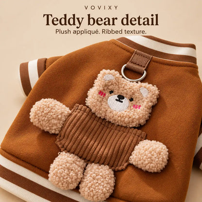 Close-up of the plush teddy bear appliqué and ribbed detail on a Brown Bear dog sweatshirt