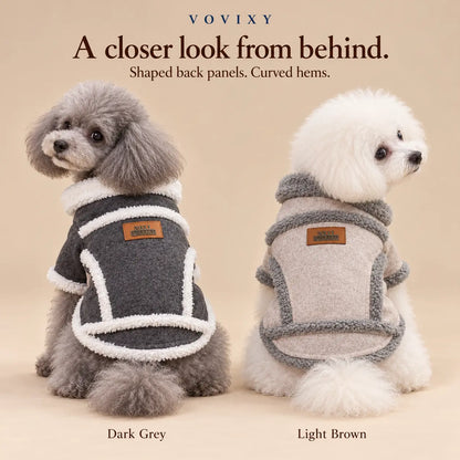 Two small dogs wearing Dark Grey and Light Brown plush trim winter coats, viewed from behind