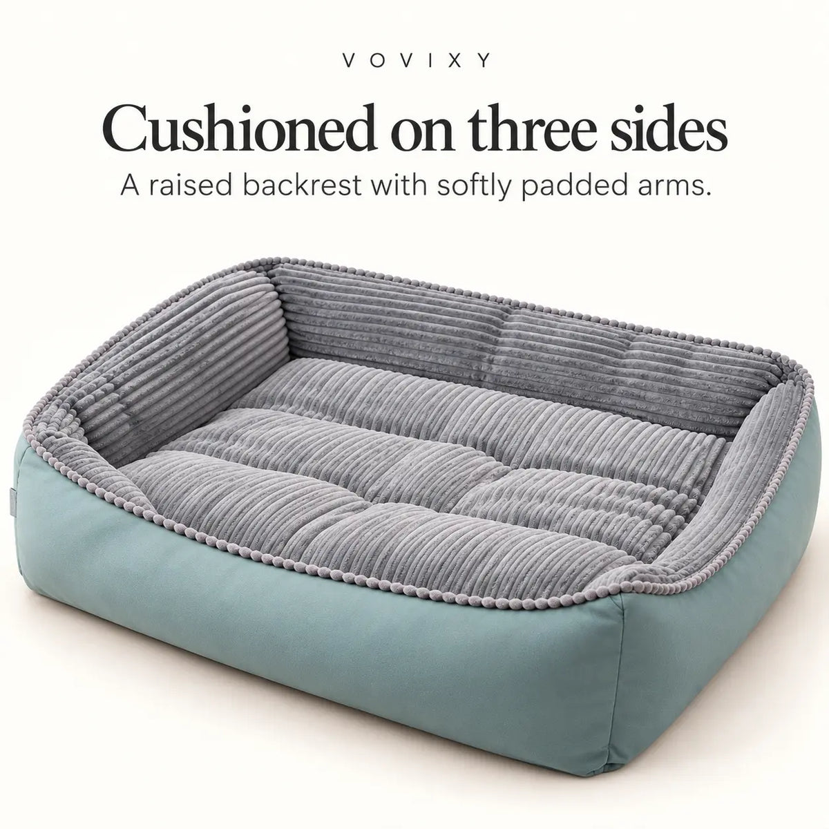 Front view of the seafoam dog sofa bed with grey velvet lining, raised back and padded sides