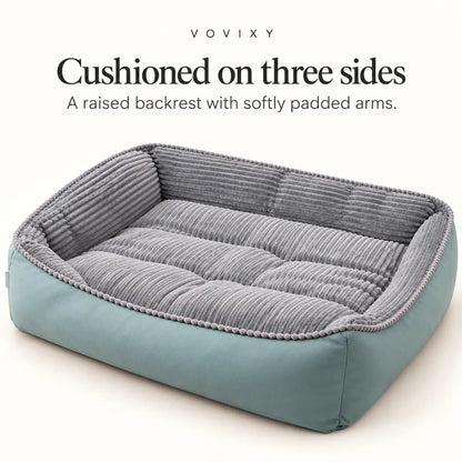 Front view of the seafoam dog sofa bed with grey velvet lining, raised back and padded sides