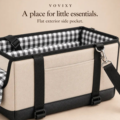 Beige pet car seat exterior side pocket, woven straps and black-and-white checked lining