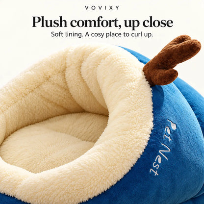 Ocean Blue slipper pet bed showing the plush opening, soft lining and antler-style accents