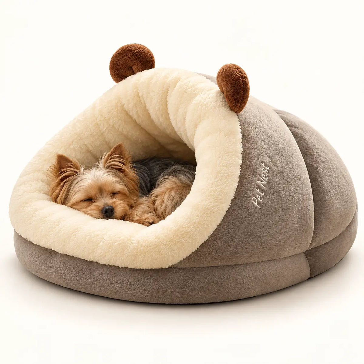 Yorkshire Terrier resting inside a Warm Taupe slipper pet bed with cream lining